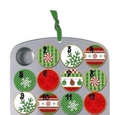 a christmas calendar with buttons and numbers on it