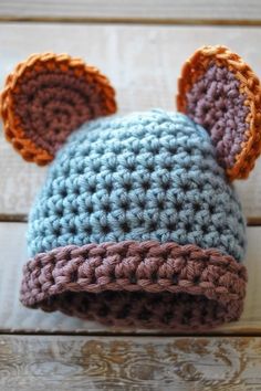 there is a crocheted hat with ears on it