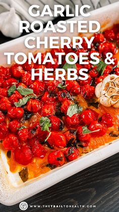 garlic roasted cherry tomatoes and herbs in a casserole dish with text overlay