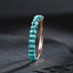 Turquoise Wedding Band Women Turquoise Half Eternity Oval Cut Wedding Band Match Stacking Band Rose Gold Handmade Jewelry Gift For Her   Main Stone: Turquoise Main Stone Color: Blue Main Stone Shape: Oval S I L V E R J E W E L R Y C A R E Silver is not the best friend of oxygen and sulfur; it can be oxidized and tarnished from time to time it is the nature of silver. To keep the silver shiny and prevent it from oxidizing fast, we would recommend the following instructions; * Avoid any chemical agents including perfume, makeup, and hair spray. * Avoid wearing silver jewelry to the beach, shower, or exercise. * Remove before you sleep, clean it with a silver cloth, and keep it in a dry area or a small zip-lock package. G E M S T O N E C A R E Major semi-precious gemstones such as amethyst, a Adjustable Oval Turquoise Ring For Wedding, Oval Turquoise Ring For Wedding, Cowgirl Lifestyle, Turquoise Wedding Band, Wedding Band Women, Beach Shower, Turquoise Wedding, Stacking Bands, Hair Spray