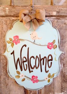 an image of a welcome sign on the door to someone's home or business