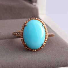 HelloWe are Lucky pay the attention for your welcome in our shop GemCARAT. You can find here very finely Handcrafted Jewelry with Natural Genuine Gemstones & Required Metal. PRODUCT SPECIFICATIONS **Main Stone Shape & Size : Natural Stabilized Turquoise Cabochon Oval 16x12mm - 1Pc **Side Stone Shape & Size : Nil **Stone Color : Blue **Band Width : 2.00mm ** Metal : 925 Sterling Silver Rose Gold Plating ** Product Weight : 10.00gm OTHER SPECIFICATIONS This Brilliant Ring is made to order. Availab December Stone, Turquoise Cocktail, Vintage Turquoise Jewelry, Brilliant Ring, Pink Engagement Ring, Ring Art Deco, Rose Yellow, Blue Band, Pink Ring