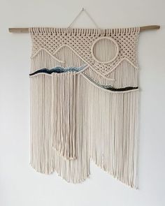 the wall hanging is made with macrame yarn