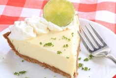 a slice of lime pie on a plate with a fork