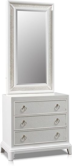 a white dresser with a mirror and drawers