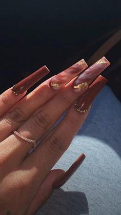 Nails Inspiration For Brown Skin, Wine And Gold Nails Acrylic, Rust Nails Acrylic, Trending Acrylic Nails 2022 Fall, Copper Acrylic Nails, Acrylic Nail Designs Brown, Brown And Gold Acrylic Nails, Fall Nail Designs Acrylic Coffin, Long Ballerina Acrylic Nails