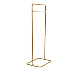 a gold metal stand with a towel rack