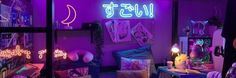 a room filled with furniture and neon lights