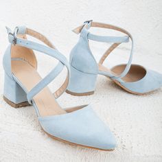 Crafted from high-quality baby blue suede vegan leather, these baby blue heels are stylish and comfortable. The sleek design of the crisscross strap provides a secure fit, while the chic dusty blue color adds a touch of simplicity and chicness to any bridal ensemble. Suede. To protect your shoes from dampness, apply a waterproof spray when they're new. For cleaning, use a mild soap solution and wipe the surface with a damp cloth that has been wrung out. Light Blue Wedding Shoes, White Lace Heels, Baby Blue Heels, Pink Stiletto Heels, Unique Wedding Shoes, Light Blue Shoes, Bridal Shoes Low Heel, Dusty Blue Color, Pink Stilettos