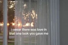 an open window with the words i swear there was love in that one look you gave me