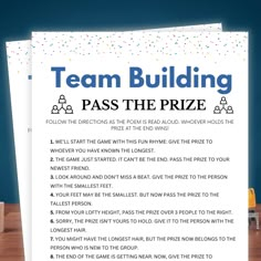 a piece of paper with the words team building pass the prize written in front of it