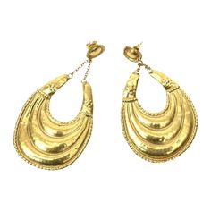 These very fine Etruscan revival style 18K gold Italian pair of pierced earrings are from an important jeweler from the 70's in Capri, Italy. They are very light in weight and fine as in the workmanship. They are a bit more fragile because of the 18K gold and lightness. Their weight is 8.2 grams, or .290 in ounces of 18K gold or 5.3 DWT. They are 3 " H or 3" L on the ear lobe. They belong to a era that is bygone from history yet have a modern look. These were purchased from a private client that traveled extensively in Capri in the 70's. Tres chic! Rose Gold Dangle Earrings, Modern Hoop Earrings, Capri Italy, Vintage Tiffany, Filigree Earrings, Loop Earrings, Tiny Diamond, Antique Earrings, Gold Earrings Dangle