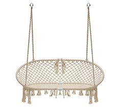 a white hanging chair with tassels on the bottom and one seat in the middle