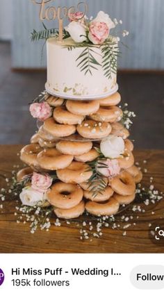 a wedding cake made out of donuts