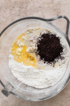 ingredients in a blender to make chocolate chip muffins on a counter top