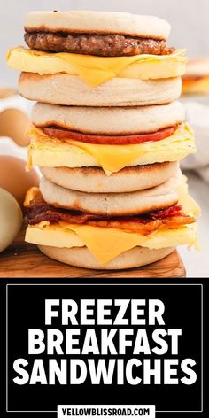 a stack of breakfast sandwiches with eggs and cheese on top, in front of the words freezer breakfast sandwiches