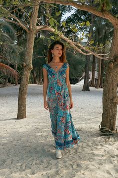 Bohemian Maxi Ruffles Dress, Elasticated Under The Chest For Perfect Fitted Look. This Elegant Flowing Dress is Light and Does Not Wrinkle, It is Made of Polyester. Its Touch is Soft Like Silk But It Is Much Easier to Care. Fluid, Light and Comfortable Fabric with Colorful Prints, Making It  The Ideal Summer Dress For The Beach, a Party or When Traveling. Free Size from s to xl Main Color: Light Blue Printing Color: Blue, Red  100% Polyester Machine wash 30o No Dryer HandMade Delivered In A Clot Summer Festival Dresses With Ruffles, Bohemian Ruffled Maxi Dress For Vacation, Bohemian Beach Dresses With Ruffles, Sleeveless Ruffled Maxi Dress For Festivals, Hippie Summer Dresses With Ruffles, Bohemian Ruffled Sundress For Vacation, Bohemian Boho Dress With Ruffles For Vacation, V-neck Boho Dress With Ruffles For Festival, Bohemian Ruffled Vacation Dress