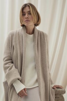 Elevate your cold-weather wardrobe with the Georgina longline cardigan. This open-front design is highlighted by its built-in scarf and ribbed cuffs, offering both warmth and sophistication. Crafted from plush cashmere, it‚Äôs a timeless piece with modern flair. 941 grams of 100% pure cashmere in 5-gauge knit Made in Italy Longline cardigan Scarf accent Open front Ribbed trim Slits at side 45" length (size small) Dry Clean Only Onyx Colour, Cocoon Cardigan, Longline Cardigan, White Cardigan, Cashmere Cardigan, Open Front Cardigan, Long Cardigan, Front Design, Ponchos