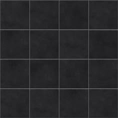 a black tile wall with squares in it