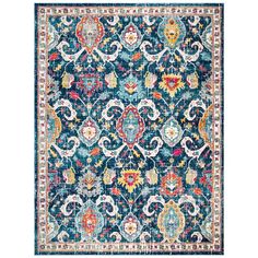 a blue rug with an ornate design on the bottom and colorful flowers in the middle