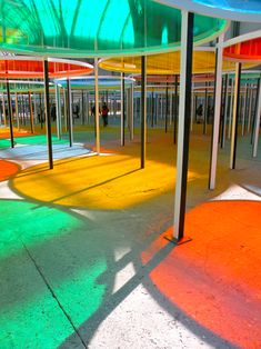 the inside of a building with multiple colored floors