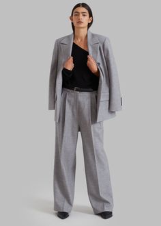 Color: Grey Midweight woven suiting fabric Relaxed silhouette Notch lapel Slightly padded shoulders Button cuffs Front flap pockets Vented back Front button closure Lined 56% Polyester 24% Rayon 18% Wool 2% Spandex Dry Clean Imported Pin Tucks, Flap Pocket, Straight Leg, Spandex, Relaxed Fit, Blazer, Grey, Pants, Fabric