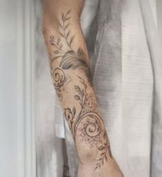 a person with a tattoo on their arm