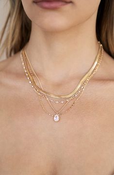 A variety of chain types gives an all-you-could-need glow to a necklace plated in 18-karat gold and twinkling with cubic zirconia. 16" shortest length; 2" longest length; 5" extender Lobster clasp closure 18k-gold plate/cubic zirconia Imported Layered Chains Gold, Layers Necklaces, Chain Types, Layer Jewelry, Gold Necklace For Women, Jeweled Collar, Xmas Wishlist, Necklace Stack, Gold Lariat Necklace