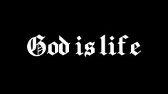 the word god is life written in black and white on a dark background with an inverted font