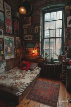 a bed room with a neatly made bed and lots of posters on the wall