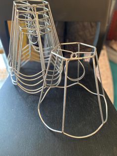 three wire baskets sitting on top of a table