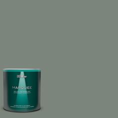 a can of marjoiee paint on a gray background