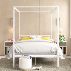 a white bed sitting in a bedroom on top of a rug