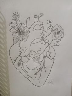 a drawing of a heart with flowers on it