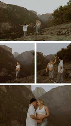 a couple holding each other while standing on top of a mountain