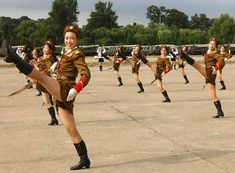 a group of women in uniform doing different things with caption that says communism