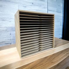 a wooden object sitting on top of a table