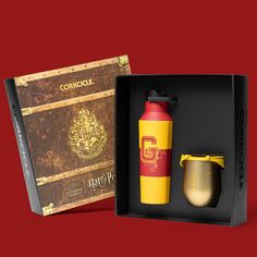 a harry potter gift set with a bottle and cup