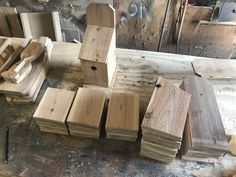 several pieces of wood sitting on top of a table