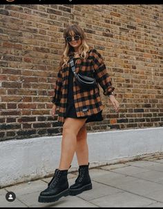 Midsize Outfits Casual Grunge, Date Night Grunge Outfit, Over Sized Outfits Women, Short Dress With Doc Martens, 90s Fashion Doc Martens Outfit, Plus Size Concert Outfit Fall, Mid Size Rocker Outfits, Fall Outfits Women Alternative, Street Style Mini Skirt