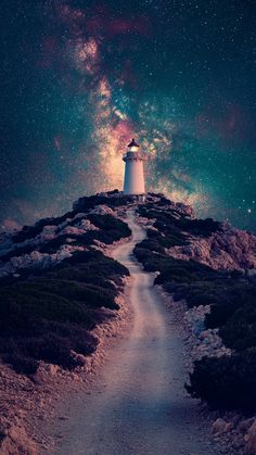 Majestic lighthouse on mountain with curved road to the top - clear night with starry sky.  #lighthouse #mountains #road #night #sky #starry Lighthouse, All Over The World, The Top