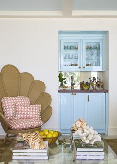 a living room filled with furniture and decor