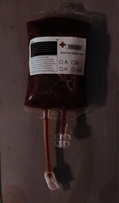 a blood bag hanging from the side of a wall