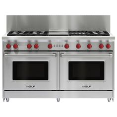 two ovens with red knobs on each side