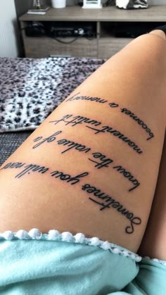 a woman's leg with writing on it