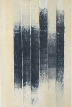 black and white photograph of vertical lines in water