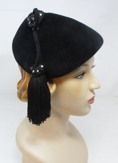 Art Deco Hat with Tassel and Rhinestones Black Vintage Hat Roaring 20s Authentic Playful Fun! I can't imagine a better hat for your next 1920s era party. Made from lush black velour felt by the Hecht Co. Designed to pin into your hair so it would fit any head size. Very good condition except the once lovely veil is now in very poor condition (see photos). Art Deco Hats, Cloche Hats, Cloche Hat, Vintage Hat, Roaring 20s, Black Vintage, Hats Vintage, Last Minute Gifts, Veil