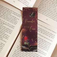 the bookmark is laying on top of an open book