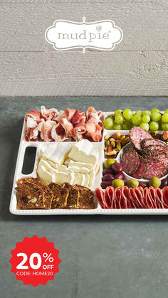 an assortment of meats and cheeses on a tray with the words muddle