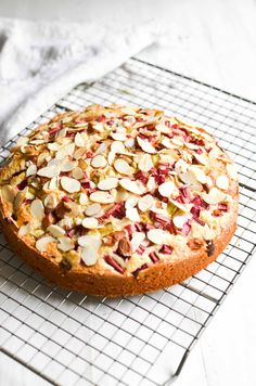 a cake sitting on top of a cooling rack